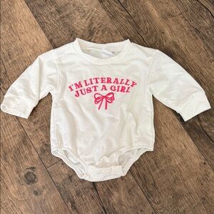 White Long Sleeve Baby Onesie with Pink Text